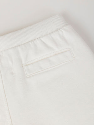 PANTALÓN FELPA BORDADO FLOR  BEIGE