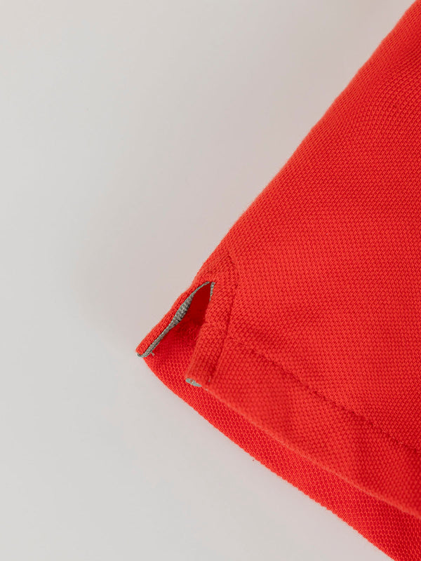 BASIC PIQUÉ POLO WITH LIGHT RED POCKET